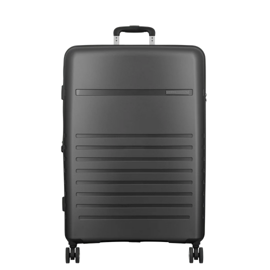 A matte black hard-shell spinner suitcase with a telescoping handle extended, shown from a front-facing perspective on a solid white background.