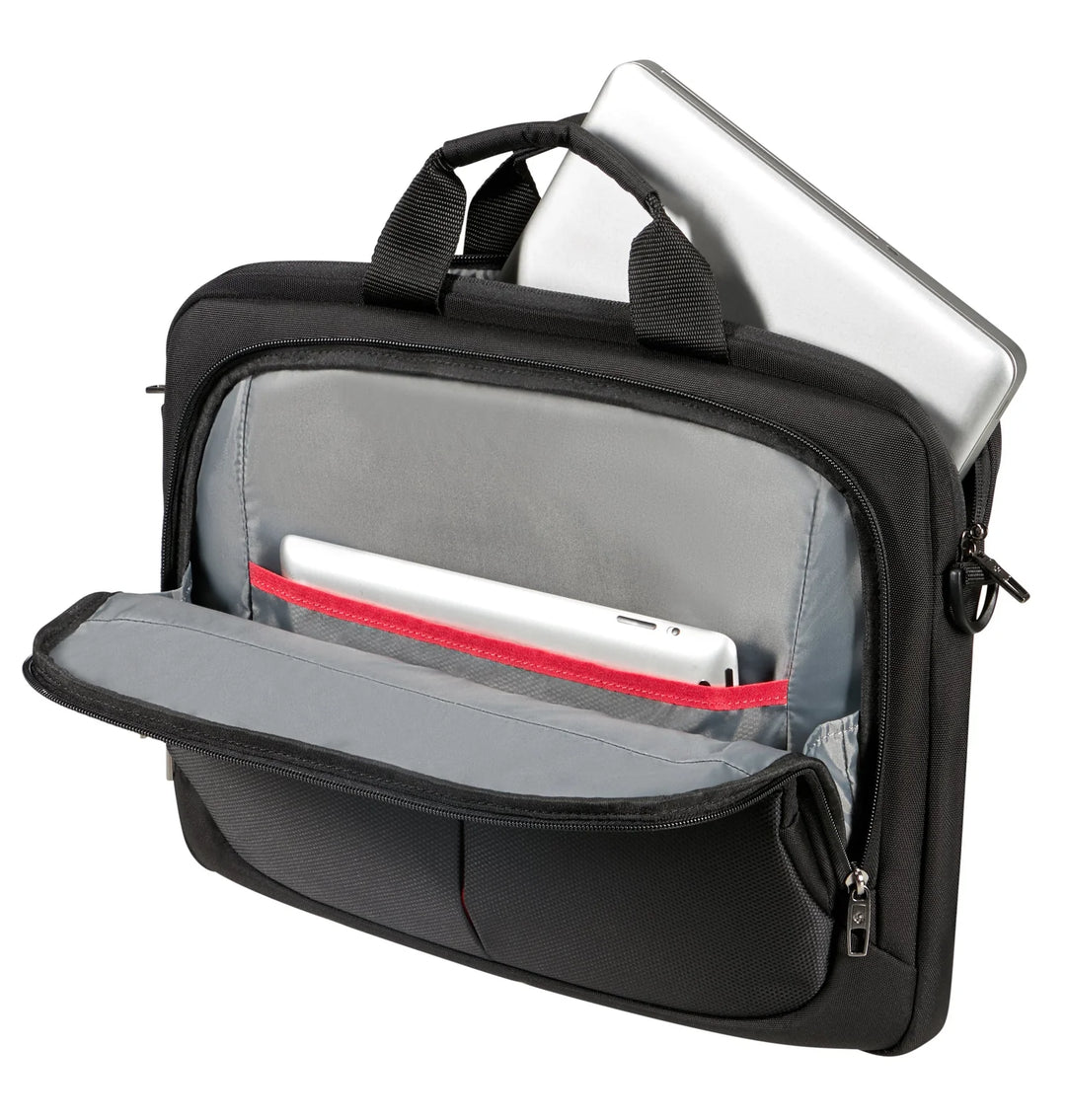 Black laptop bag with compartments containing a silver laptop and other items on a white background